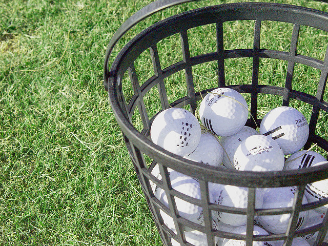 Bucket of Balls with a Hot Dog and a Pop Image